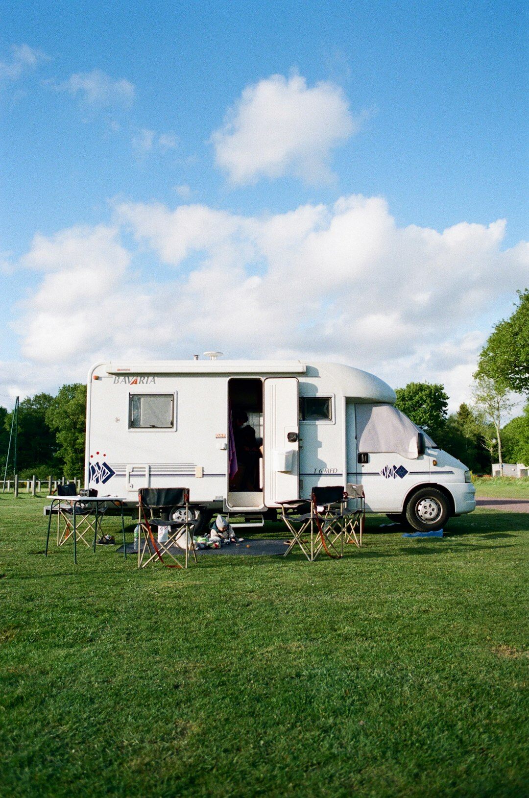 Outside broadcast van with satellite dish parked outside an event